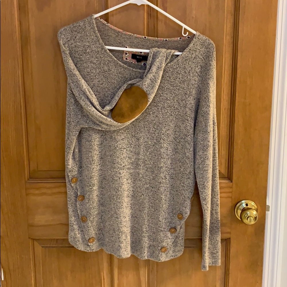 Sweater with leather elbow pads and buttons